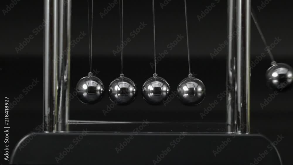 Newton's cradle physics concept for action and reaction or cause and effect. Balls Newton slow motion. Newton's cradle physics concept for action and reaction or cause and effect. Balls Newton slow motion.
