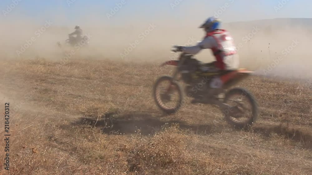 Motobikes at the Motocross and the Dust Motobikes at the Motocross and the Dust