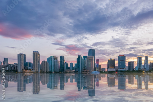 Dynamic Miami skyline, business and office skyscrapers at against beautiful sunset © DarwelShots
