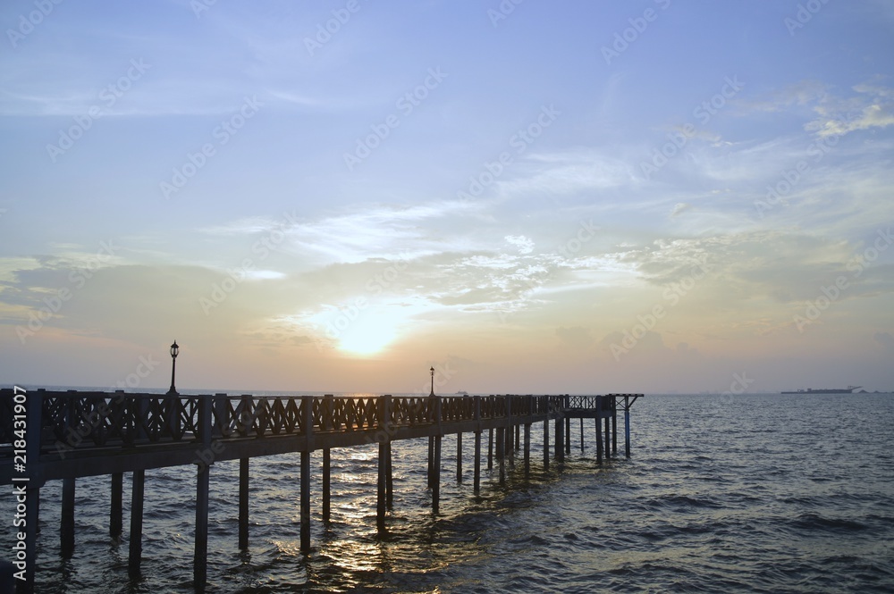 a jetty during sunrise