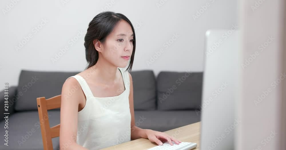 Woman working on computer at home Woman working on computer at home