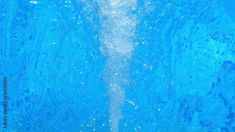 A water spring of a blue swiming pool