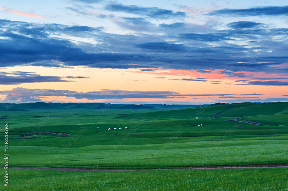The mongolian yurts in summer grassland sunrise. The mongolian yurts in summer grassland sunrise.