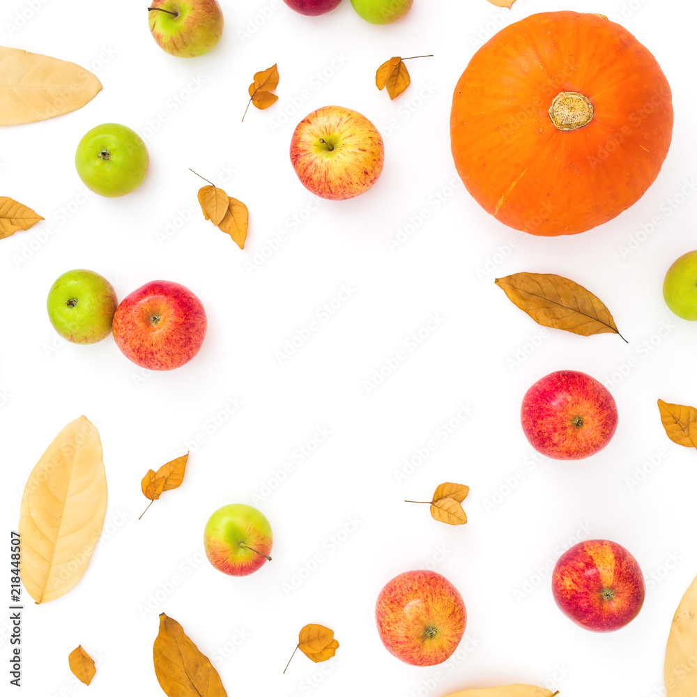 Autumn frame of fall leaves, pine cones, apples and pumpkin on white background. Thanksgiving day. Flat lay, top view Autumn frame of fall leaves, pine cones, apples and pumpkin on white background. Thanksgiving day. Flat lay, top view
