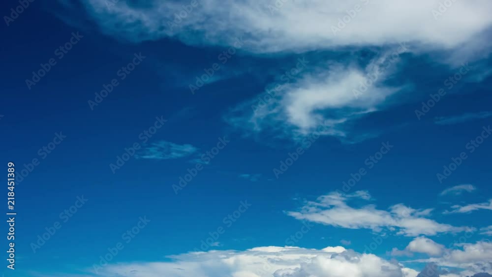 Time lapse clip of white fluffy clouds over blue sky Time lapse clip of white fluffy clouds over blue sky