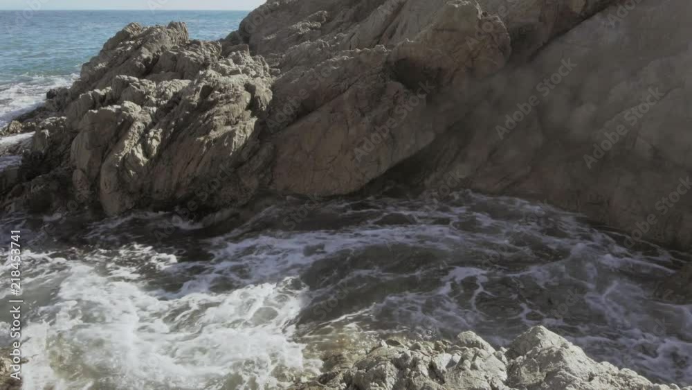 Fresh sea water rushing into a Pacific Coast tidepool to refresh the anenomes and mussels with nutrients and food. Point Reyes, CA. Fresh sea water rushing into a Pacific Coast tidepool to refresh the anenomes and mussels with nutrients and food. Point Reyes, CA.