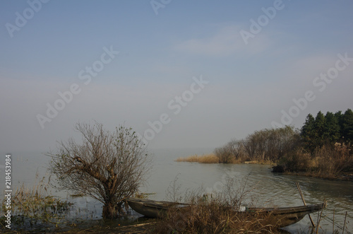 A Old Small Boat on the Riverside