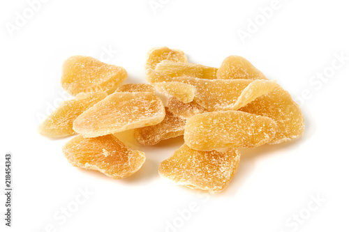 Heap of dried sweet ginger with sugar isolated on a white background.