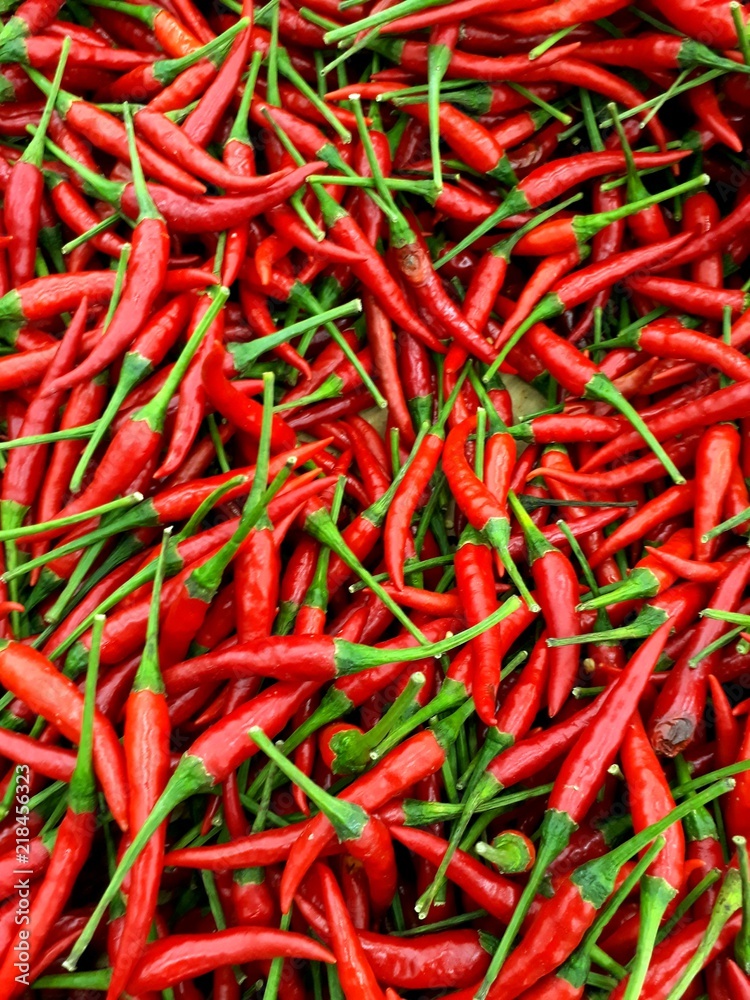 Closeup shot of Chill peppers as background Closeup shot of Chill peppers as background