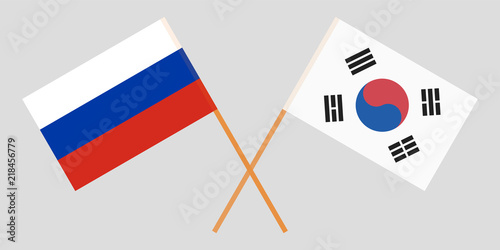 Crossed flags South Korea and Russia. Official colors. Correct proportion. Vector
