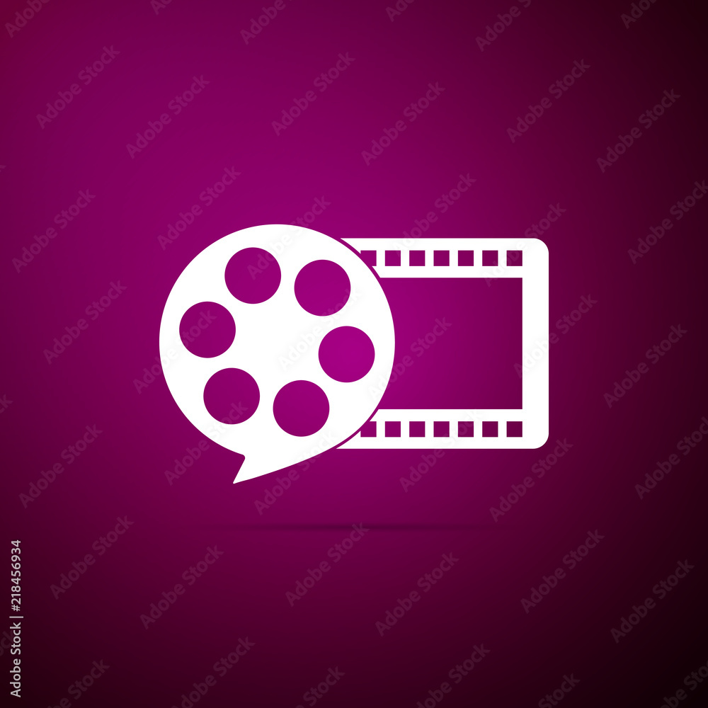Film reel and play video movie film icon isolated on purple background. Flat design. Vector Illustration Film reel and play video movie film icon isolated on purple background. Flat design. Vector Illustration