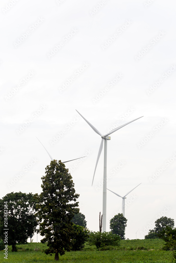 Windmills for electric power production with blue sky Windmills for electric power production with blue sky