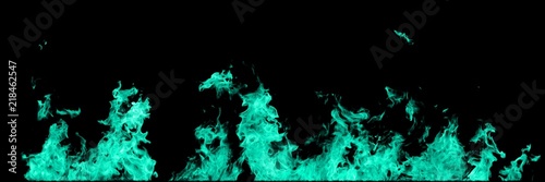 Real teal, sea-green line of fire flames isolated on black background. Mockup on black of wall of fire.