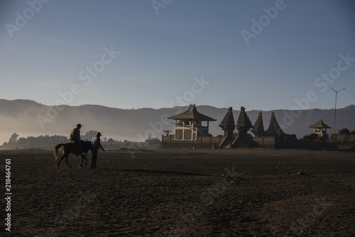 Silhouette of people and Horseman at the mountainside of Mount Bromo  Semeru  Tengger National Park  Indonesia.