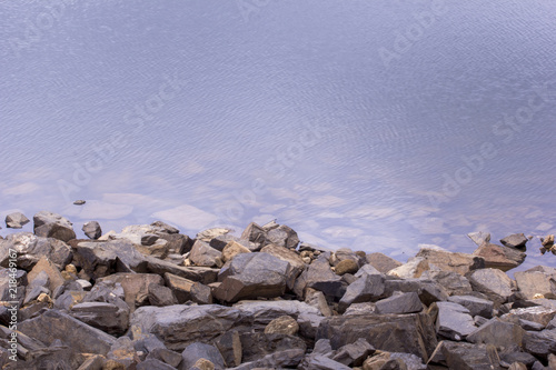 Natural stone in water. Abstract background.