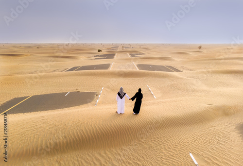 emirati couple in a desert