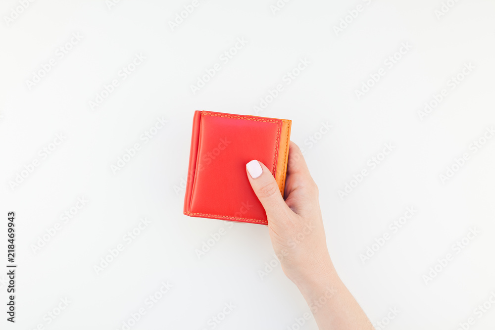 Woman hand with red wallet isolated Woman hand with red wallet isolated