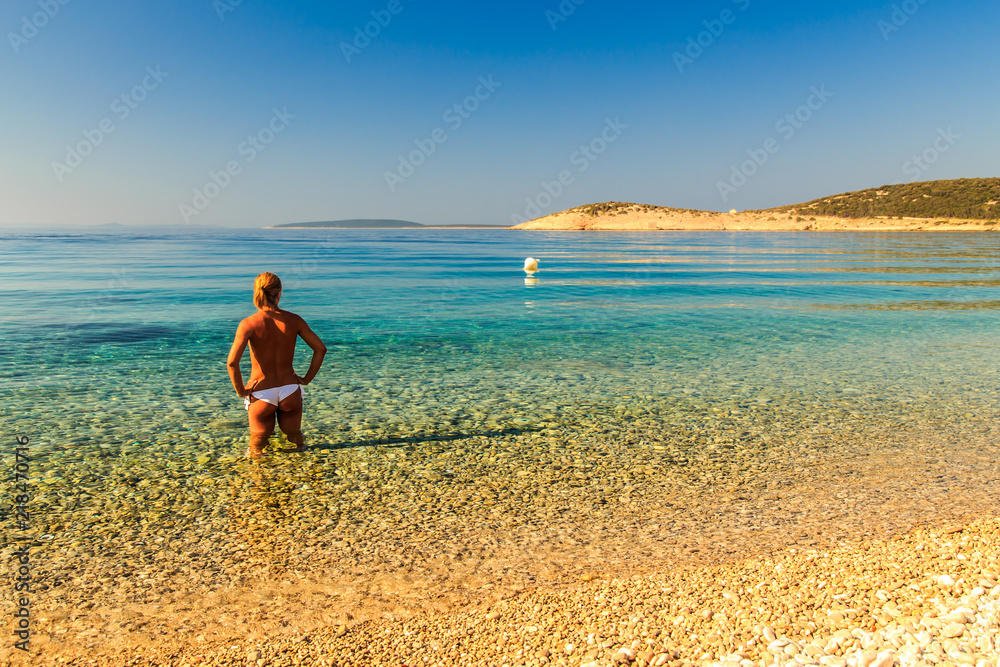 Obraz premium Girl at the sea in Croatia