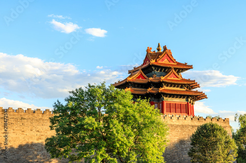 Watchtower of Forbidden City at sunset Beijing China