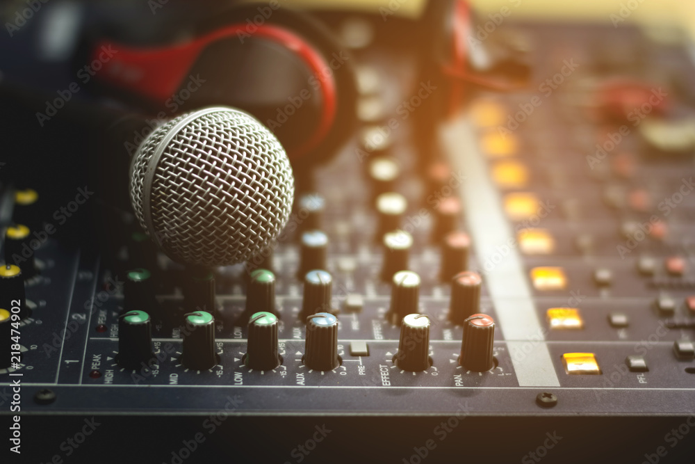 Microphones and audio mixers at the recording studio.Selective focus . Microphones and audio mixers at the recording studio.Selective focus .