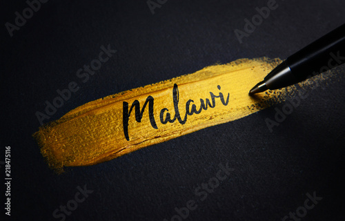 Malawi Handwriting Text on Golden Paint Brush Stroke