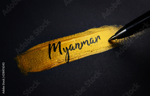 Myanmar Handwriting Text on Golden Paint Brush Stroke