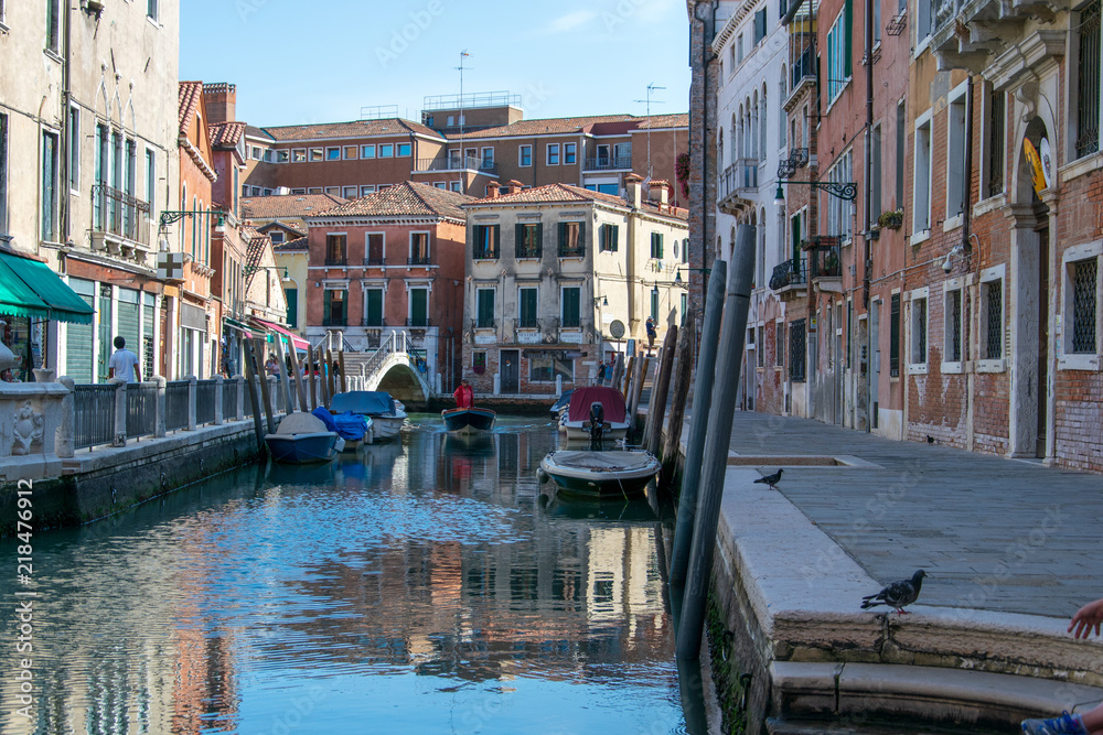 View of a water channel and its navigation in Venice Italy 