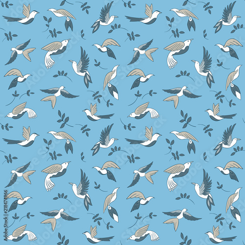 Seamless pattern with little birds and  leaves. Vector illustration on blue background.