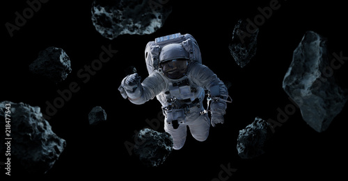 Fototapeta Naklejka Na Ścianę i Meble -  Astronaut isolated on black background 3D rendering elements of this image furnished by NASA