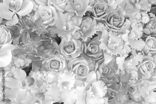 Artistic Background of Artificial Plastic Flowers in black and white photography.Artificial flowers are imitations of natural plants normally used for commercial and residential decoration. photo