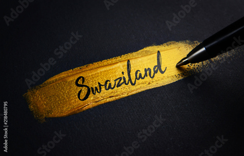 Swaziland Handwriting Text on Golden Paint Brush Stroke