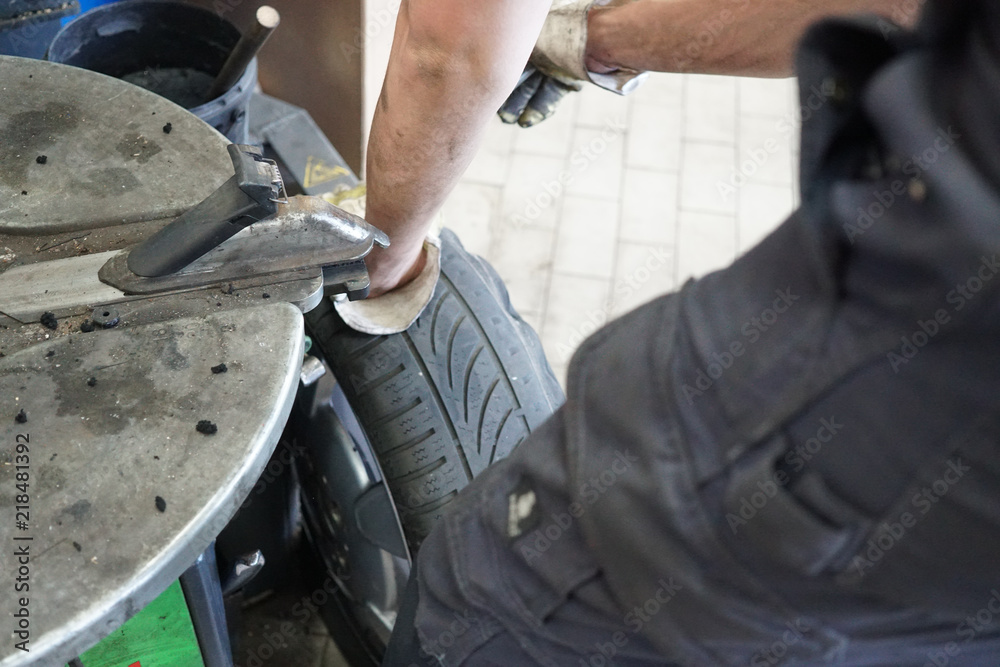 Tire changing in an auto repair shop Tire changing in an auto repair shop