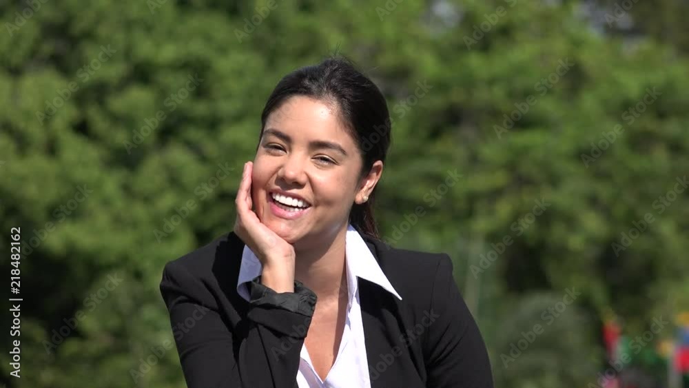 Laughing Hispanic Business Woman