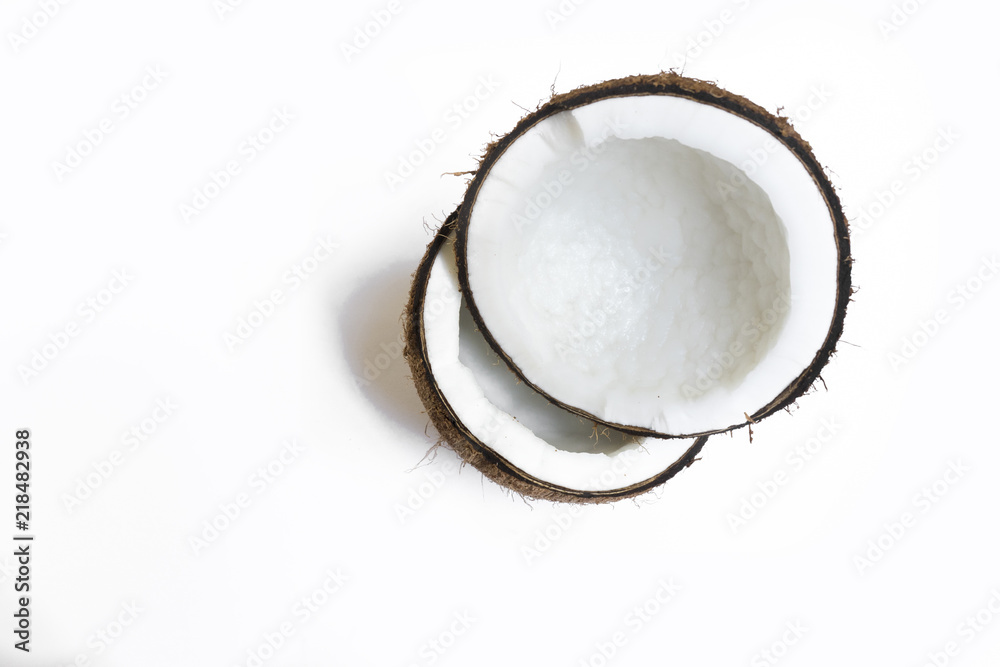 coconut broken isolated on a white background for making coconut milk , Or cosmetics for the spa. coconut broken isolated on a white background for making coconut milk , Or cosmetics for the spa.