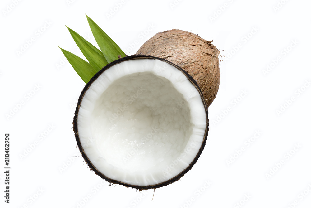 coconut broken and leaves  isolated on a white background  for making coconut milk , Or cosmetics for the spa.