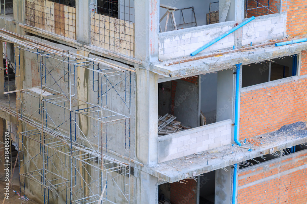 Obraz premium high big building construction site in develop city. with copy space add text