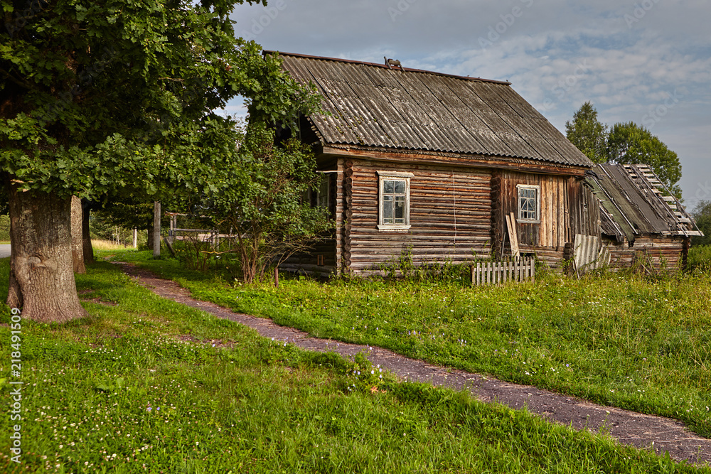 Peasant's log hut,  wooden house, cabin built with logs.