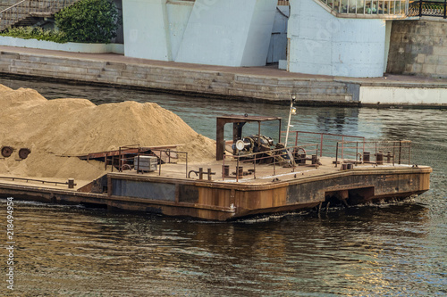 River cargo ferry carrying sand