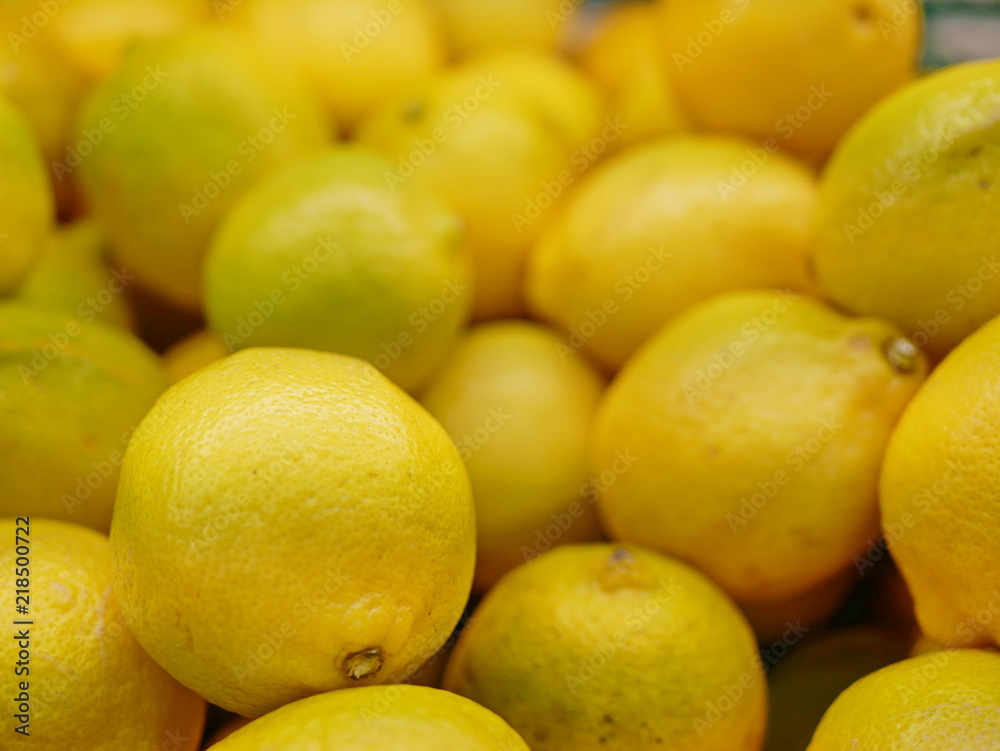 Close up and selective focus background of yellow limes