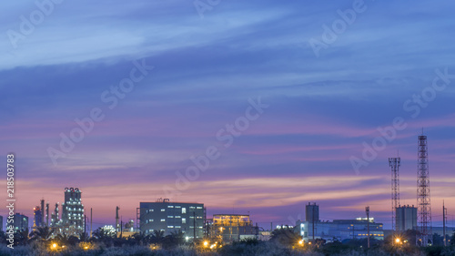 Petrochemical plant in Asia at night for your design, card, postcard, wallpaper or your concept,Copy space for you text © YSTUDIO