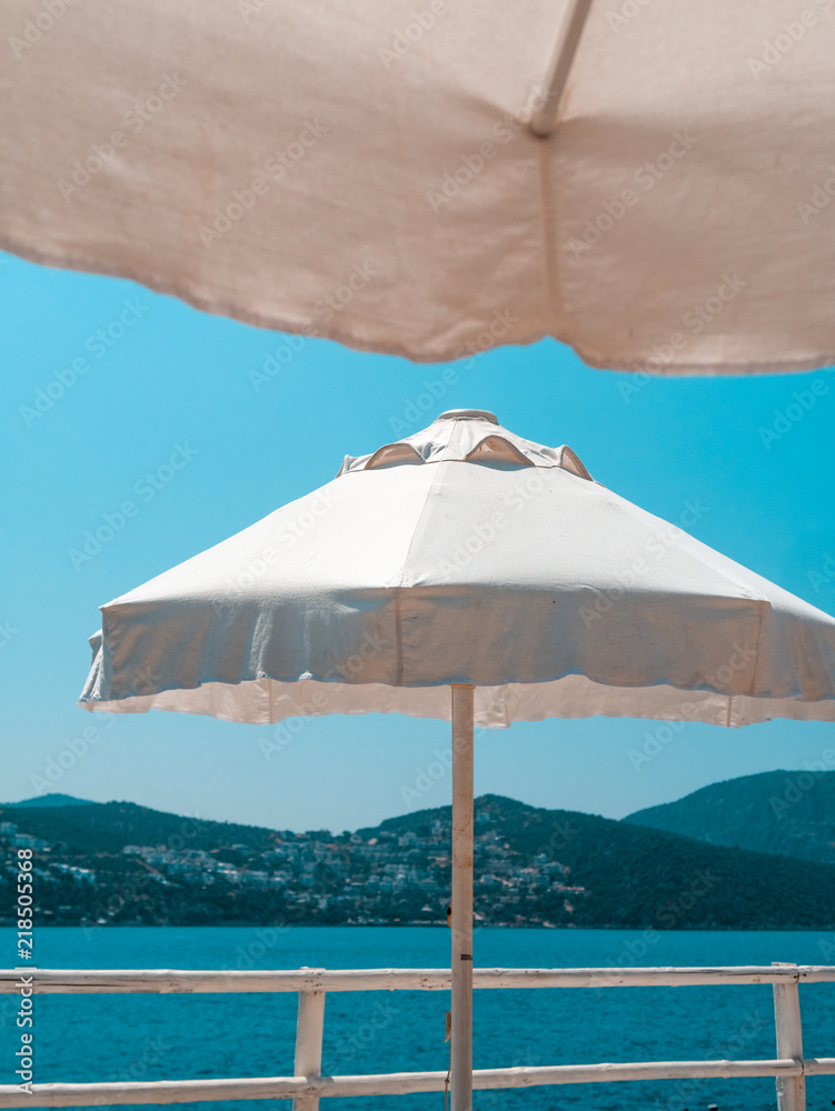Beach Umbrellas against Blue Sky