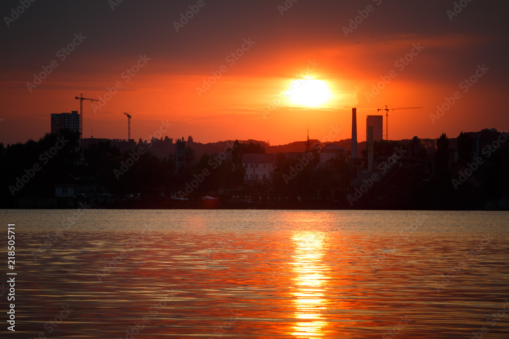 Silhouette panorama at sunset colorful sky over Dnipro river