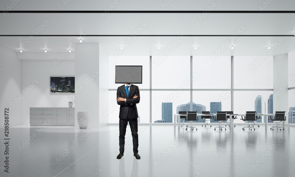 Fototapeta premium Businessman with TV instead of head.