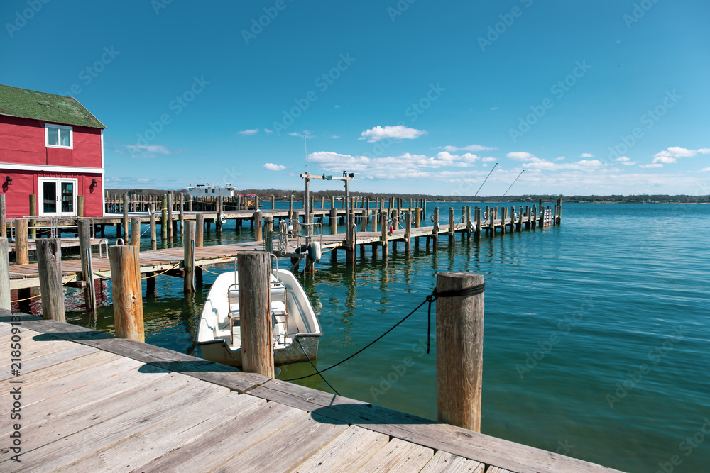 Fototapeta premium House and Wooden dock or pier by the lake with sky and cloud in 