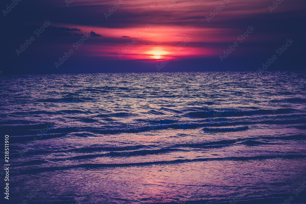 Nature in twilight period which including of sunrise over the sea and the nice beach. Summer beach with blue water and purple sky at the sunset. Nature in twilight period which including of sunrise over the sea and the nice beach. Summer beach with blue water and purple sky at the sunset.