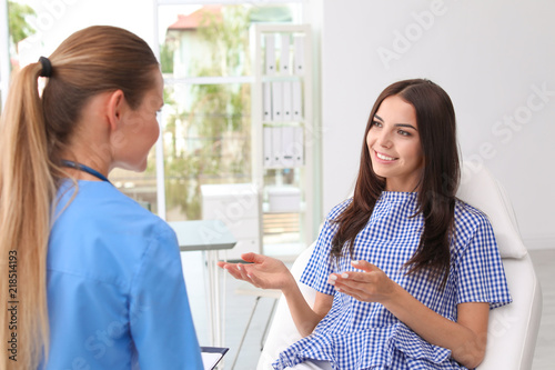 Patient having appointment with doctor in hospital