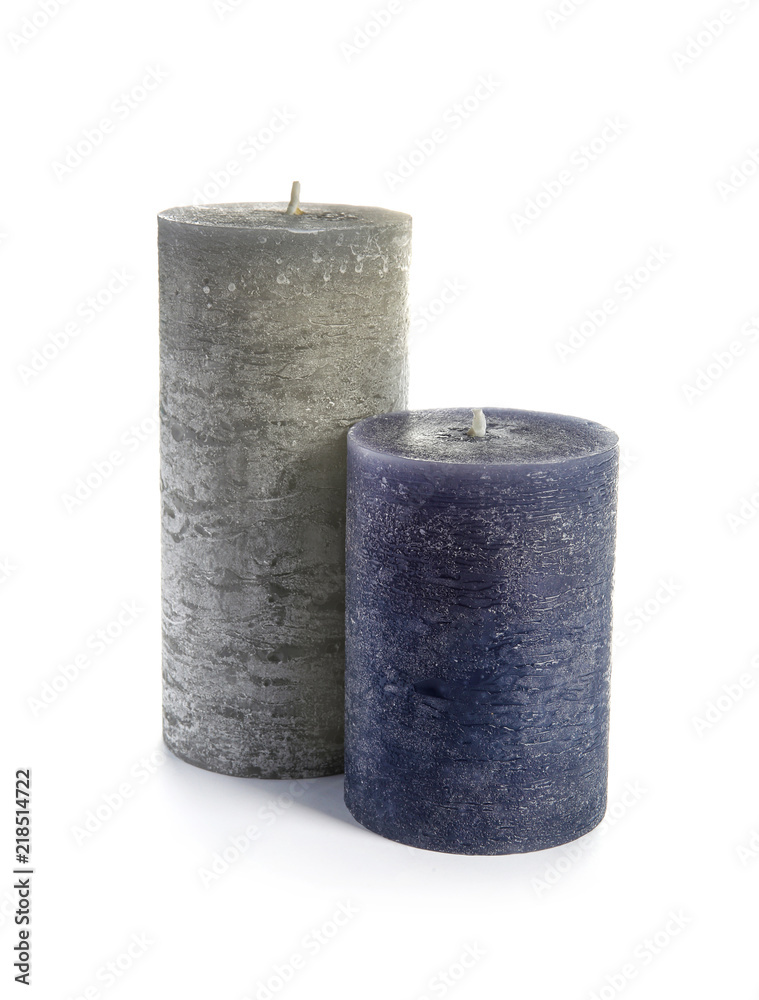 Two decorative wax candles on white background Two decorative wax candles on white background