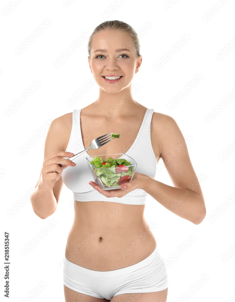 Young woman with salad on white background. Healthy diet Young woman with salad on white background. Healthy diet