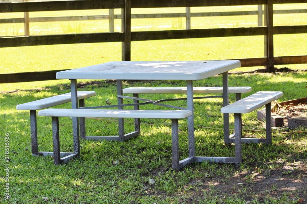 White Picnic Table in Shade on Farm White Picnic Table in Shade on Farm
