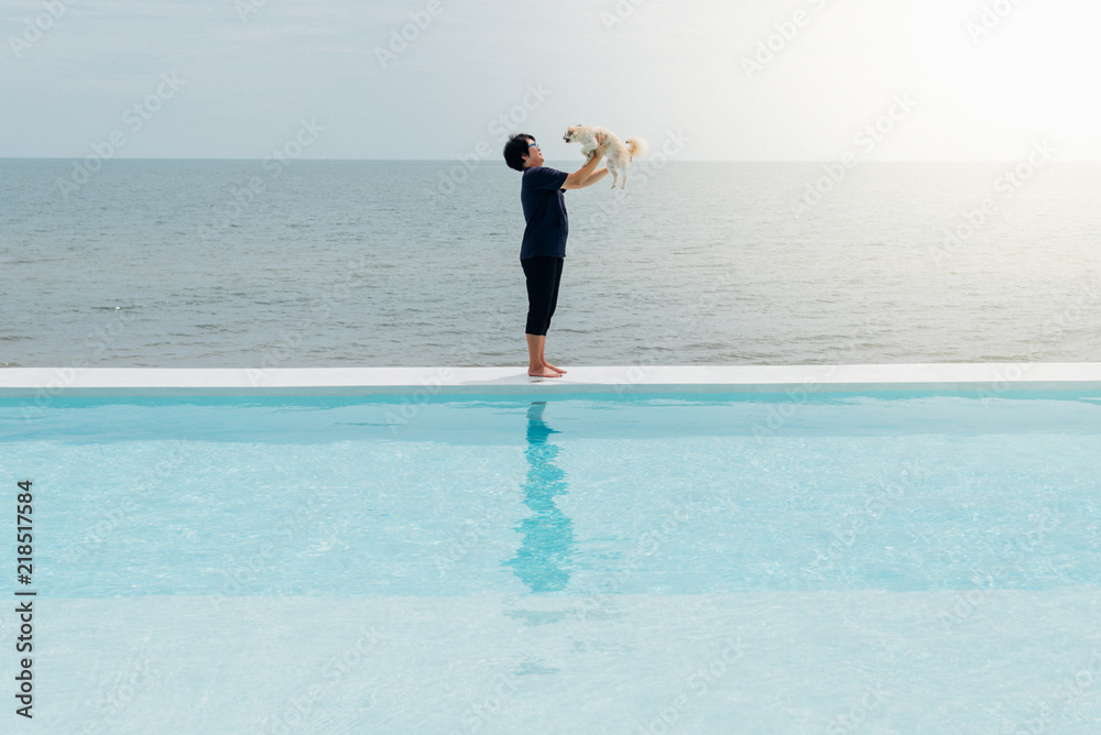 Woman and dog at outdoor swimming seaside the sea Woman and dog at outdoor swimming seaside the sea